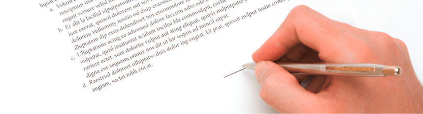 02 Hand signing a document with a pen.