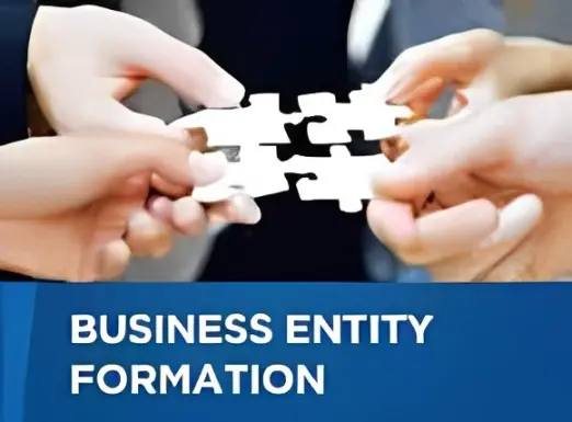 Hands joining puzzle pieces: business formation.